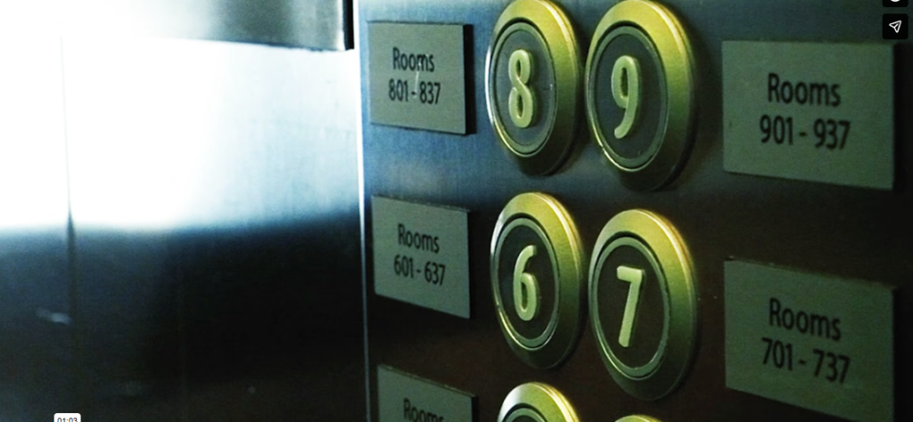 Elevator control panel showing room-number floor buttons